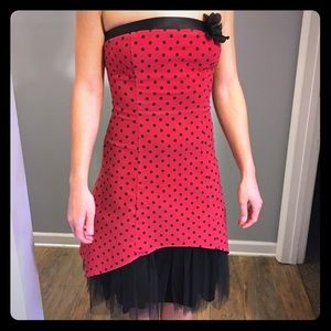 Strapless red and black polka dot semiformal dress
